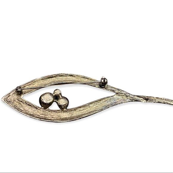 Black metal eye shaped brooch with 3 rhinestones intact - Picture 5 of 10